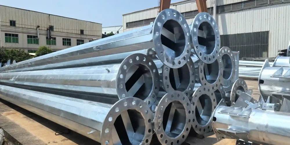 Galvanized steel pipes with flanges on wooden platform